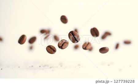 Roasted coffee beans cascade from the sky, creating a whimsical and aromatic scene of nature's coffee bounty 127739228