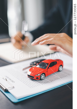 Concept business vehicle finance protection office plan investment buy sell car ensuring idea financial security. automobile agent hand protect purchase insurance and secure favorable loan deal. Concept business vehicle finance protection office plan investment buy sell car ensuring idea financial security. automobile agent hand protect purchase insurance and secure favorable loan deal. 127739365