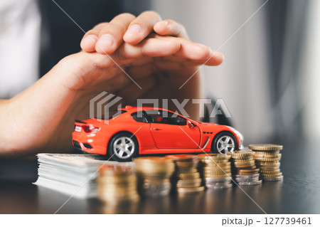 Concept business vehicle finance protection office plan investment buy sell car ensuring idea financial security. automobile agent hand protect purchase insurance and secure favorable loan deal. Concept business vehicle finance protection office plan investment buy sell car ensuring idea financial security. automobile agent hand protect purchase insurance and secure favorable loan deal. 127739461