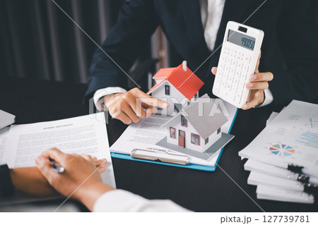 Concept business house finance protection office plan investment buy sell home ensuring idea financial security. residence agent hand protect purchase insurance and secure favorable loan deal. Concept business house finance protection office plan investment buy sell home ensuring idea financial security. residence agent hand protect purchase insurance and secure favorable loan deal. 127739781