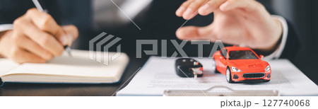 Concept business vehicle finance protection office plan investment buy sell car ensuring idea financial security. automobile agent hand protect purchase insurance and loan deal. banner with copy space Concept business vehicle finance protection office plan investment buy sell car ensuring idea financial security. automobile agent hand protect purchase insurance and loan deal. banner with copy space 127740068