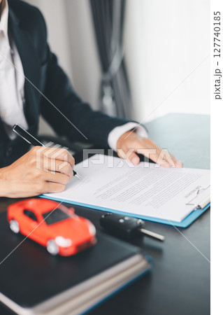 Concept business vehicle finance protection office plan investment buy sell car ensuring idea financial security. automobile agent hand protect purchase insurance and secure favorable loan deal. 127740185