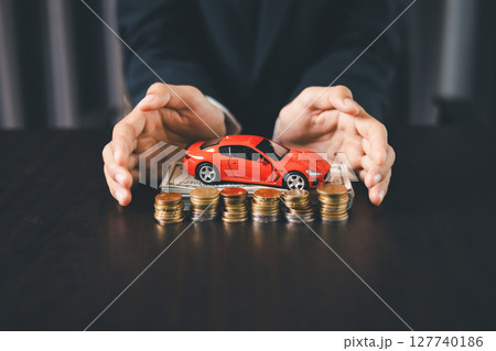Concept business vehicle finance protection office plan investment buy sell car ensuring idea financial security. automobile agent hand protect purchase insurance and secure favorable loan deal. 127740186