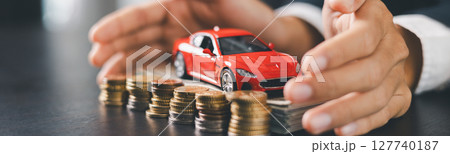 Concept business vehicle finance protection office plan investment buy sell car ensuring idea financial security. automobile agent hand protect purchase insurance and loan deal. banner with copy space Concept business vehicle finance protection office plan investment buy sell car ensuring idea financial security. automobile agent hand protect purchase insurance and loan deal. banner with copy space 127740187