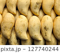Close-Up of Ripe Yellow Mangoes. (Barracuda mango) 127740244