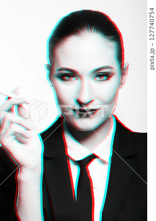 Woman portrait with black suit and cigarette in RGB color split effect Woman portrait with black suit and cigarette in RGB color split effect 127740754