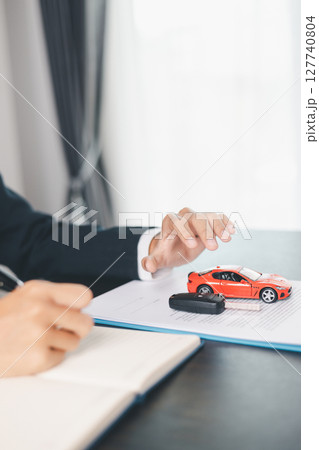 Concept business vehicle finance protection office plan investment buy sell car ensuring idea financial security. automobile agent hand protect purchase insurance and secure favorable loan deal. 127740804