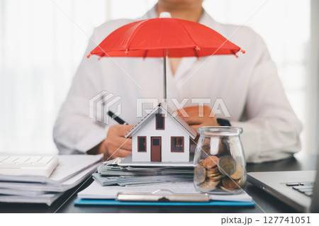 Concept business house finance protection office plan investment buy sell home ensuring idea financial security. residence agent hand protect purchase insurance and secure favorable loan deal. Concept business house finance protection office plan investment buy sell home ensuring idea financial security. residence agent hand protect purchase insurance and secure favorable loan deal. 127741051