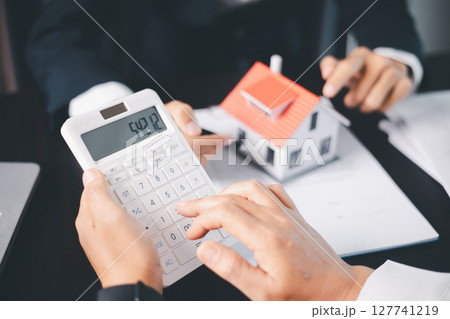 Concept business house finance protection office plan investment buy sell home ensuring idea financial security. residence agent hand protect purchase insurance and secure favorable loan deal. 127741219