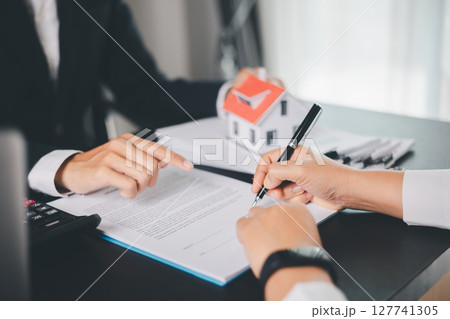 Concept business house finance protection office plan investment buy sell home ensuring idea financial security. residence agent hand protect purchase insurance and secure favorable loan deal. 127741305