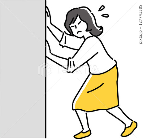 壁を押す女性 127741385