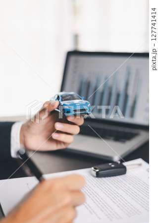 Concept business vehicle finance protection office plan investment buy sell car ensuring idea financial security. automobile agent hand protect purchase insurance and secure favorable loan deal. Concept business vehicle finance protection office plan investment buy sell car ensuring idea financial security. automobile agent hand protect purchase insurance and secure favorable loan deal. 127741414