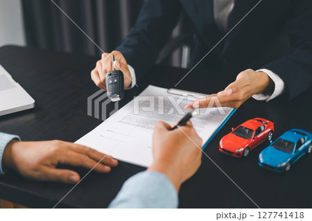 Concept business vehicle finance protection office plan investment buy sell car ensuring idea financial security. automobile agent hand protect purchase insurance and secure favorable loan deal. 127741418