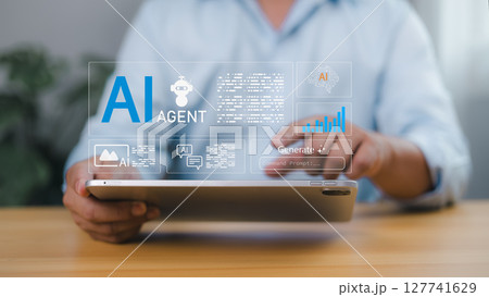 Person using a tablet to AI agent concepts, showcasing artificial intelligence assistant tools, machine learning, automation, chatbots, data analysis, smart technology for future business solutions. 127741629