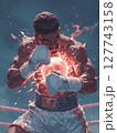 A boxer in full gear, fists raised and ready to punch, with a focused expression under the intense lights of the ring. Motivational concept for boxing enthusiasts. 127743158
