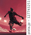 A football player in full athletic gear, poised to kick the ball with explosive power, under the bright stadium lights. Motivational concept for football lovers. 127743251