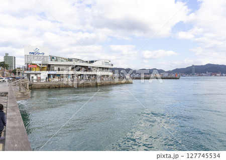 Shimonoseki, Japan - Dec 29,2022 : Seaside promenade at the Aruka Port in Shimonoseki, Japan on Dec 29,2022. 127745534