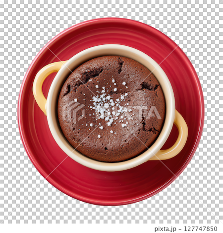 Delicious Chocolate Lava Cake Served in a Cute Bowl on a Bright Red Plate with a Sprinkle of Sea Salt 127747850