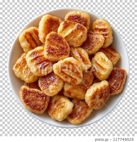 Golden Brown Gnocchi Served in a Bowl, Delicious Potato Dumplings with a Crispy Texture, Ideal for Culinary Inspiration 127748028