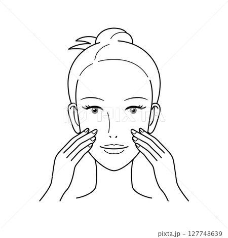 スキンケアをする女性 指先で顔を触る スキンケアをする女性 指先で顔を触る 127748639