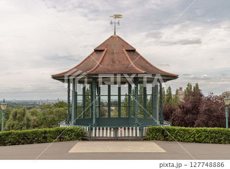 a Victorian-style bandstand offering panoramic views of the London skyline. a Victorian-style bandstand offering panoramic views of the London skyline. 127748886
