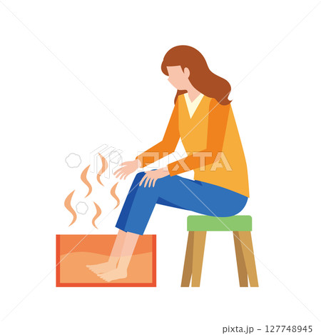 足湯で足を温める女性 足湯で足を温める女性 127748945