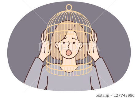 Girl with cage on head screams having fallen into mental trap negatively affects psychological state 127748980