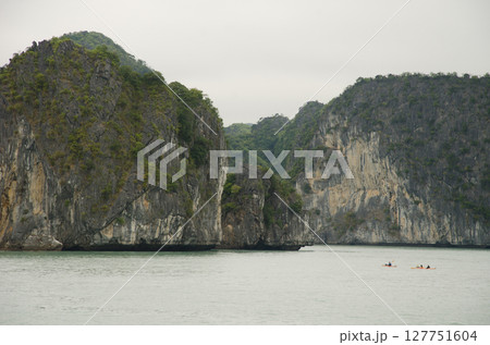 People kayaking in Lan Ha Bay. People kayaking in Lan Ha Bay. 127751604