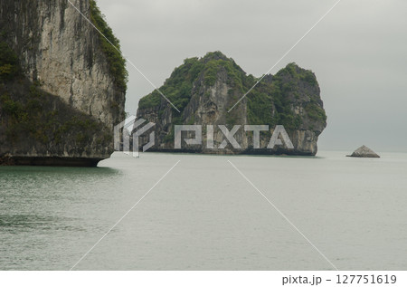 Limestone cliffs in Lan Ha Bay. Limestone cliffs in Lan Ha Bay. 127751619
