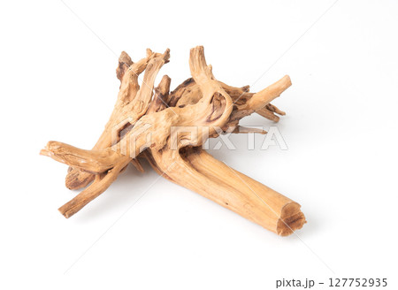 Dry driftwood isolated on white background, natural decorative element for aquariums or interior design. 127752935