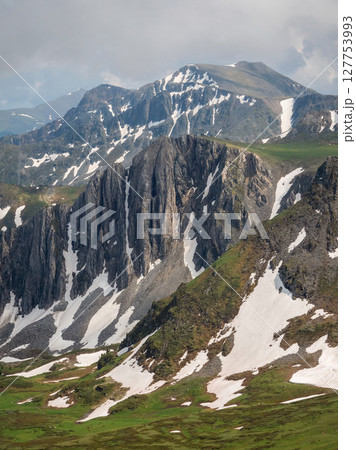 Vivid scenery with high mountains, vertical view 127753993