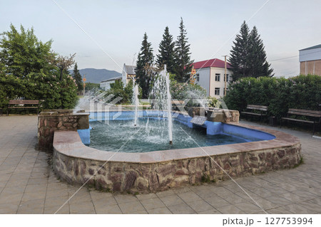 Fountain in Ust-Koksa Altai Republic, evening park Fountain in Ust-Koksa Altai Republic, evening park 127753994