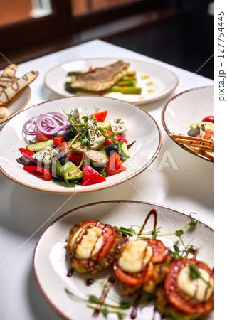 Mediterranean Lunch Spread with Salad and Fish 127754445