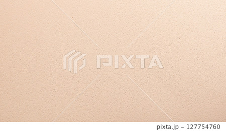Minimalistic closeup of beige and cream designer paper. Monochrome surface with matte finish, fiber 127754760