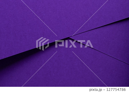Premium designer paper in violet and purple tones with matte surface and elegant texture. Premium designer paper in violet and purple tones with matte surface and elegant texture. 127754786