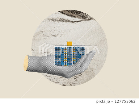 Home purchase concept with a hand holding money, symbolizing mortgage, loan, and real estate 127755062