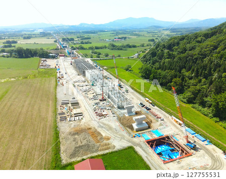初夏の北海道八雲町でJR北海道新幹線八雲駅周辺工事現場の風景を空撮 初夏の北海道八雲町でJR北海道新幹線八雲駅周辺工事現場の風景を空撮 127755531