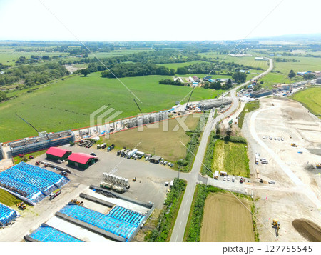 初夏の北海道八雲町でJR北海道新幹線八雲駅周辺工事現場の風景を空撮 初夏の北海道八雲町でJR北海道新幹線八雲駅周辺工事現場の風景を空撮 127755545