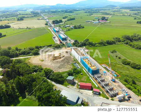 初夏の北海道八雲町でJR北海道新幹線八雲駅周辺工事現場の風景を空撮 初夏の北海道八雲町でJR北海道新幹線八雲駅周辺工事現場の風景を空撮 127755551
