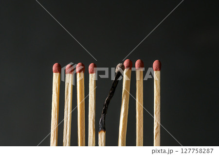 Matches and one burned match. Abstract concept of burnout, stress and depression 127758287