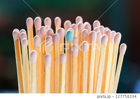 Group of pink matches and one blue match. Diversity, inclusion abstract concept 127758334