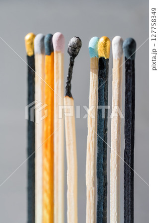 Group of colourful matches and one burned match. Diversity, inclusion abstract concept 127758349