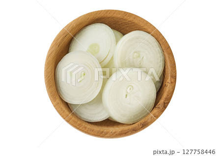 Onion slices in a wooden bowl isolated on a white background. Top view. Flat lay. 127758446