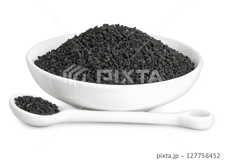 Nigella sativa or Black cumin in ceramic bowl isolated on white background Nigella sativa or Black cumin in ceramic bowl isolated on white background 127758452