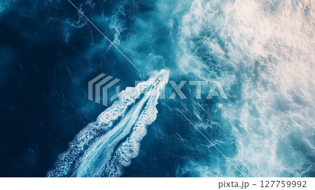 Speed boat on blue ocean water journey transportation aerial  view 127759992