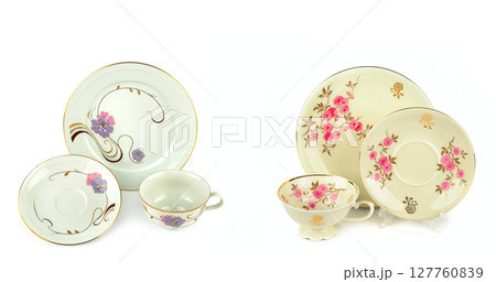 Porcelain vintage cup and saucer isolated on white background. Porcelain vintage cup and saucer isolated on white background. 127760839