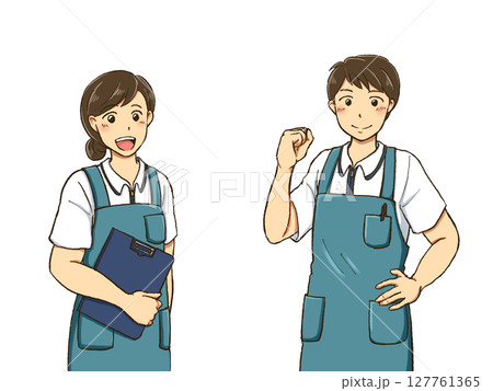 エプロンをつけてガッツポーズをするポロシャツの男女 127761365
