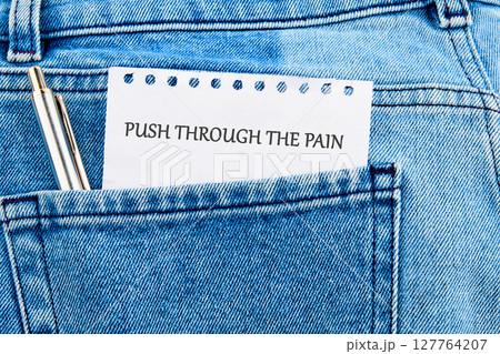 Despite discomfort concept. Words PUSH THROUGH THE PAIN Despite discomfort concept. Words PUSH THROUGH THE PAIN 127764207
