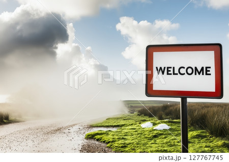 Welcome sign on the road. Foggy landscape 127767745