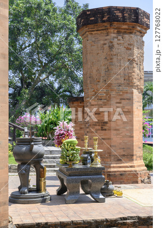 Buddhist altar and ancient Po Nagar Cham Towers built in the 8th century in Nha Trang, Vietnam Buddhist altar and ancient Po Nagar Cham Towers built in the 8th century in Nha Trang, Vietnam 127768022